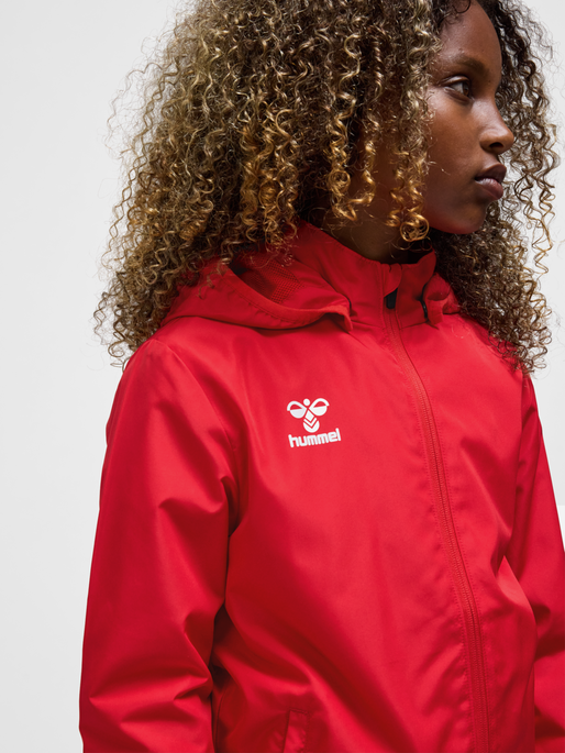 hmlESSENTIAL AW JACKET KIDS, TRUE RED, model