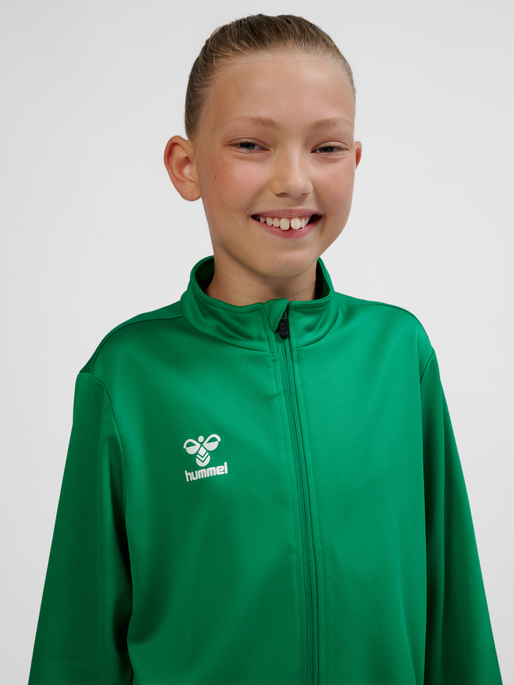 hmlESSENTIAL TRACK JACKET KIDS, JELLY BEAN, model