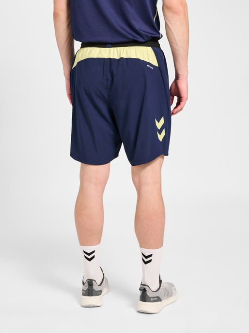hmlBLAZE 2.0 TRAINING SHORTS, MARINE/SHADOW LIME, model