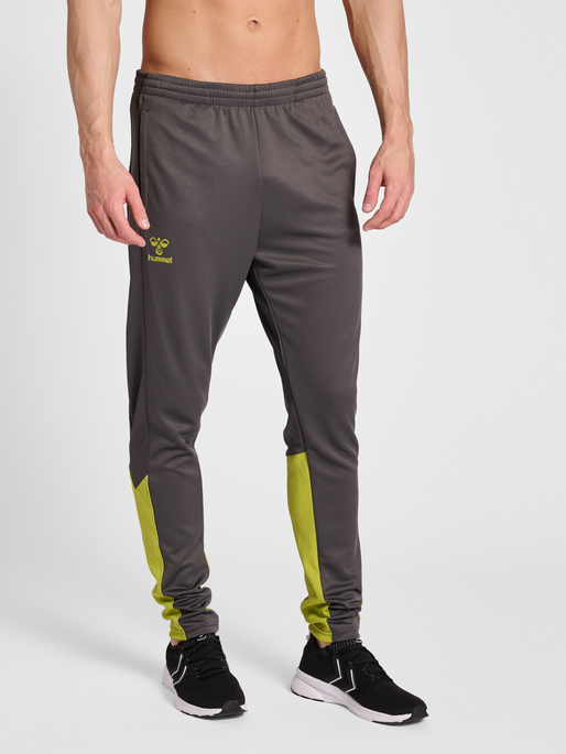 hmlONGRID POLY PANTS, FORGED IRON/DARK CITRON, model