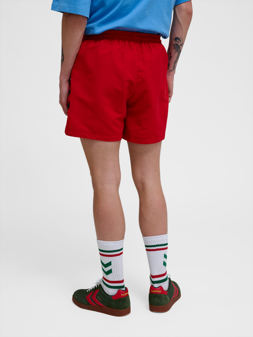 hmlNED SWIM SHORTS, BARBADOS CHERRY, model