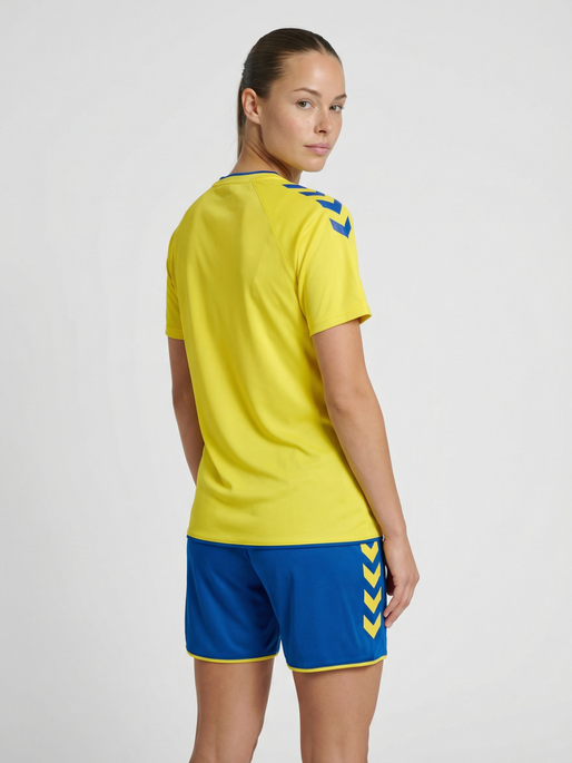 hmlCORE 2.0 JERSEY S/S WOMAN, BLAZING YELLOW/TRUE BLUE, model