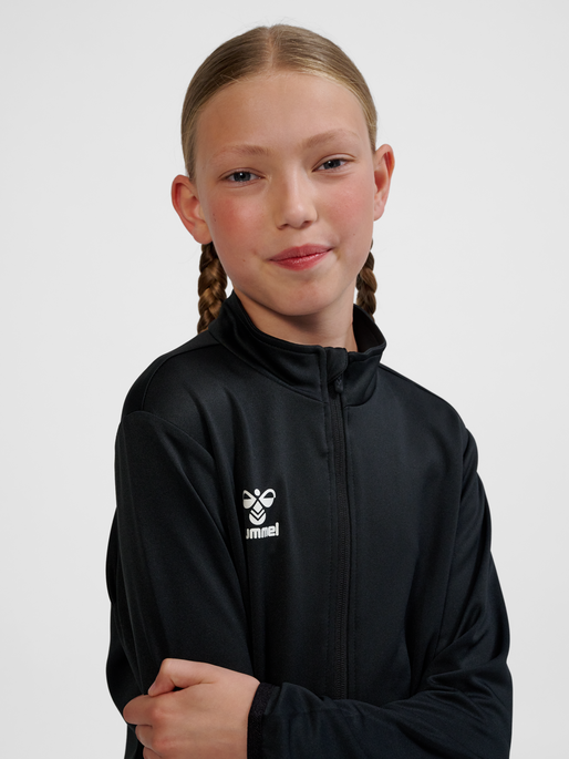 hmlESSENTIAL TRACK JACKET KIDS, BLACK, model