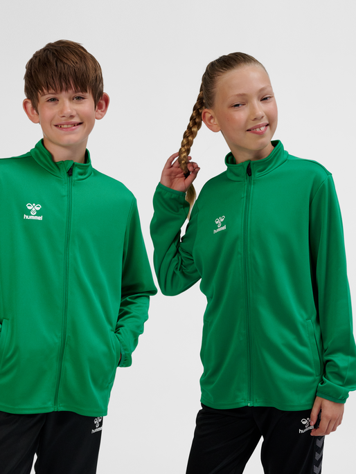 hmlESSENTIAL TRACK JACKET KIDS, JELLY BEAN, model