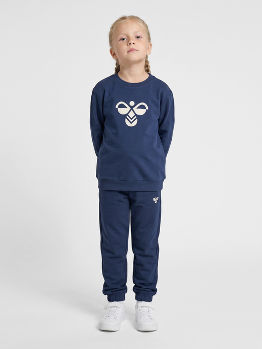 hmlJR REG TUKAS PANTS, DRESS BLUES, model