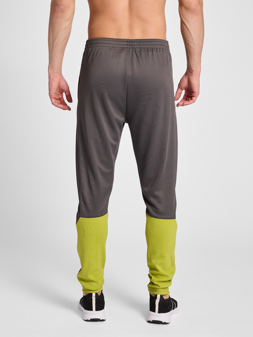 hmlONGRID POLY PANTS, FORGED IRON/DARK CITRON, model