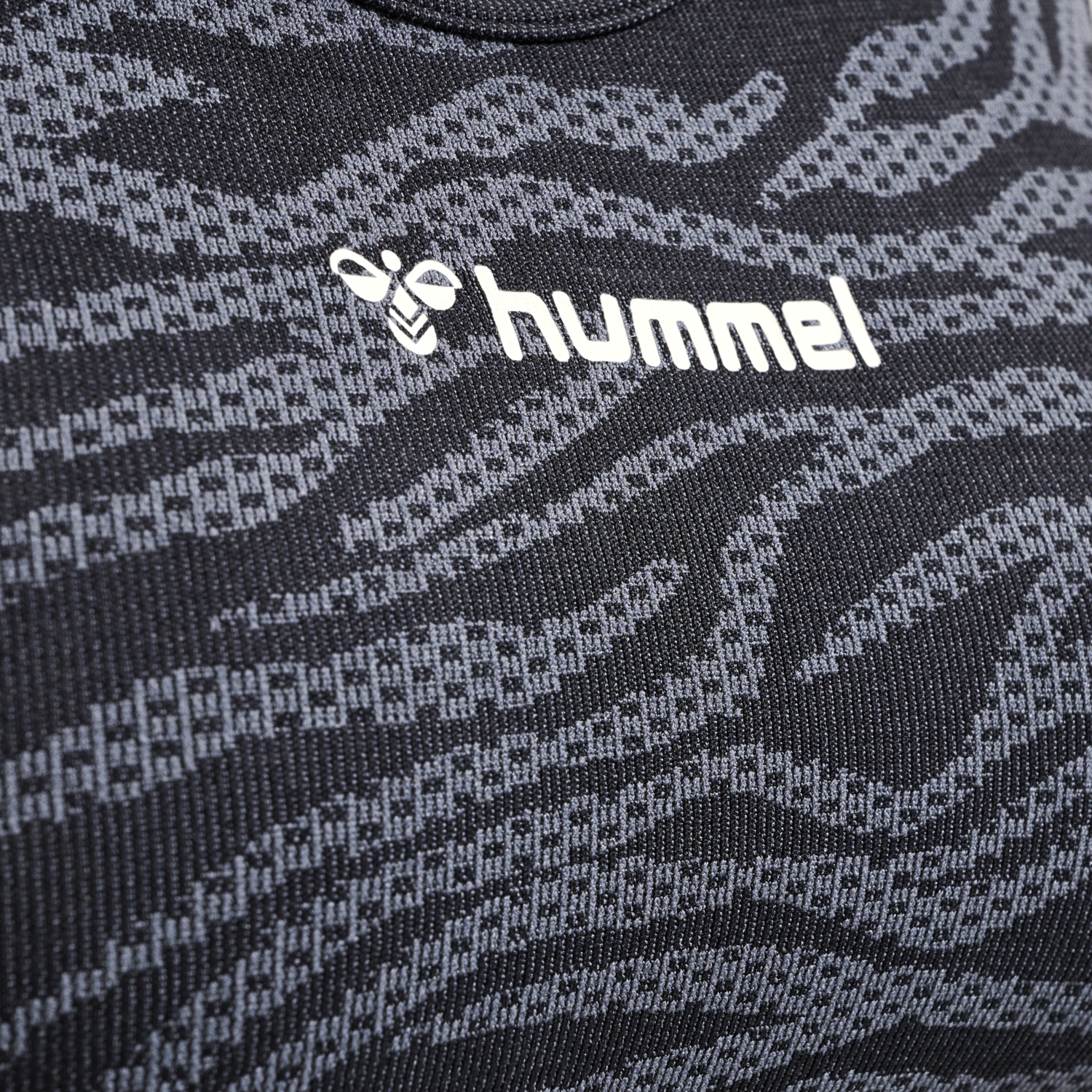 hmlMT SAGA SEAMLESS SPORTS TOP, BLACK/ASPHALT MELANGE, packshot