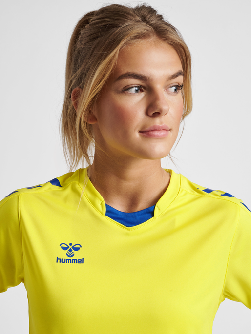hmlCORE XK POLY JERSEY S/S WOMAN, BLAZING YELLOW/TRUE BLUE, model