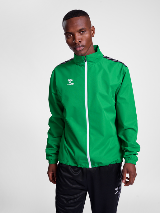 hmlAUTHENTIC TRAINING JACKET, JELLY BEAN, model