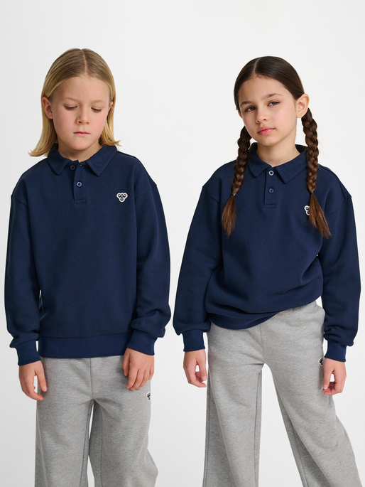 hmlJR LOOSE PIQUE POLO SWEATSHIRT, DRESS BLUES, model