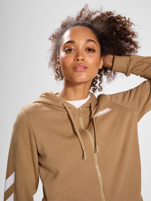 hmlLEGACY WOMAN ZIP HOODIE, TIGERS EYE, model