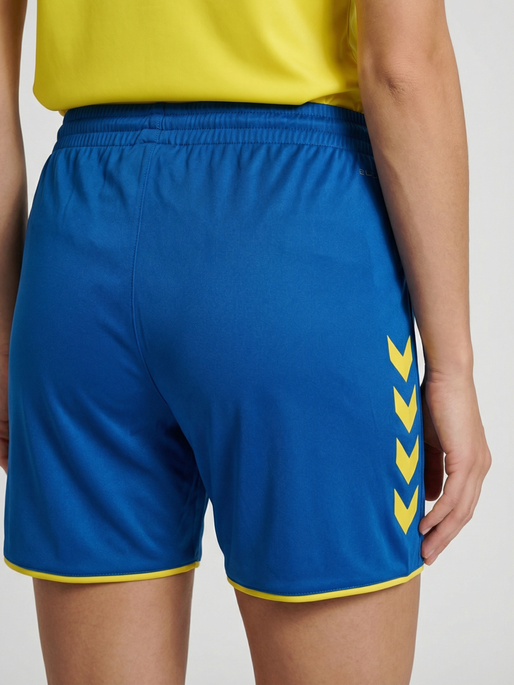 hmlCORE 2.0 SHORTS WOMAN, TRUE BLUE/BLAZING YELLOW, model